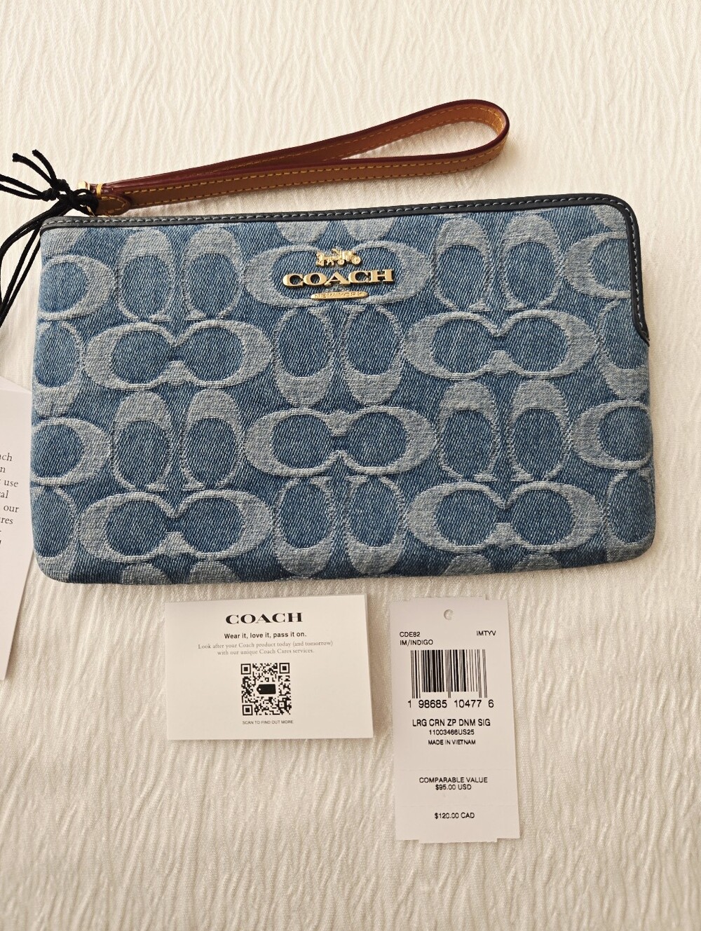 Coach Denim Signature Large  Wristlet in Blue with Tan Strap